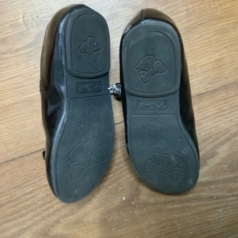 Nina “Jami” Black Patent Shoes
